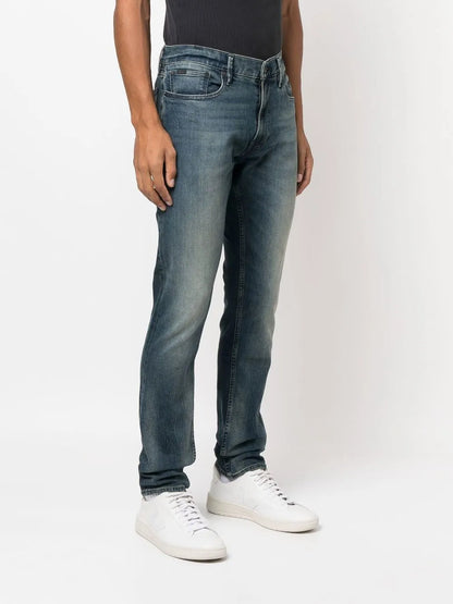 jeans slim com lavagem stonewashed